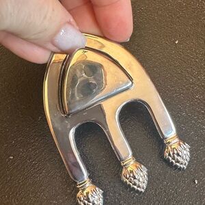 Silver coated casserole spoon rest